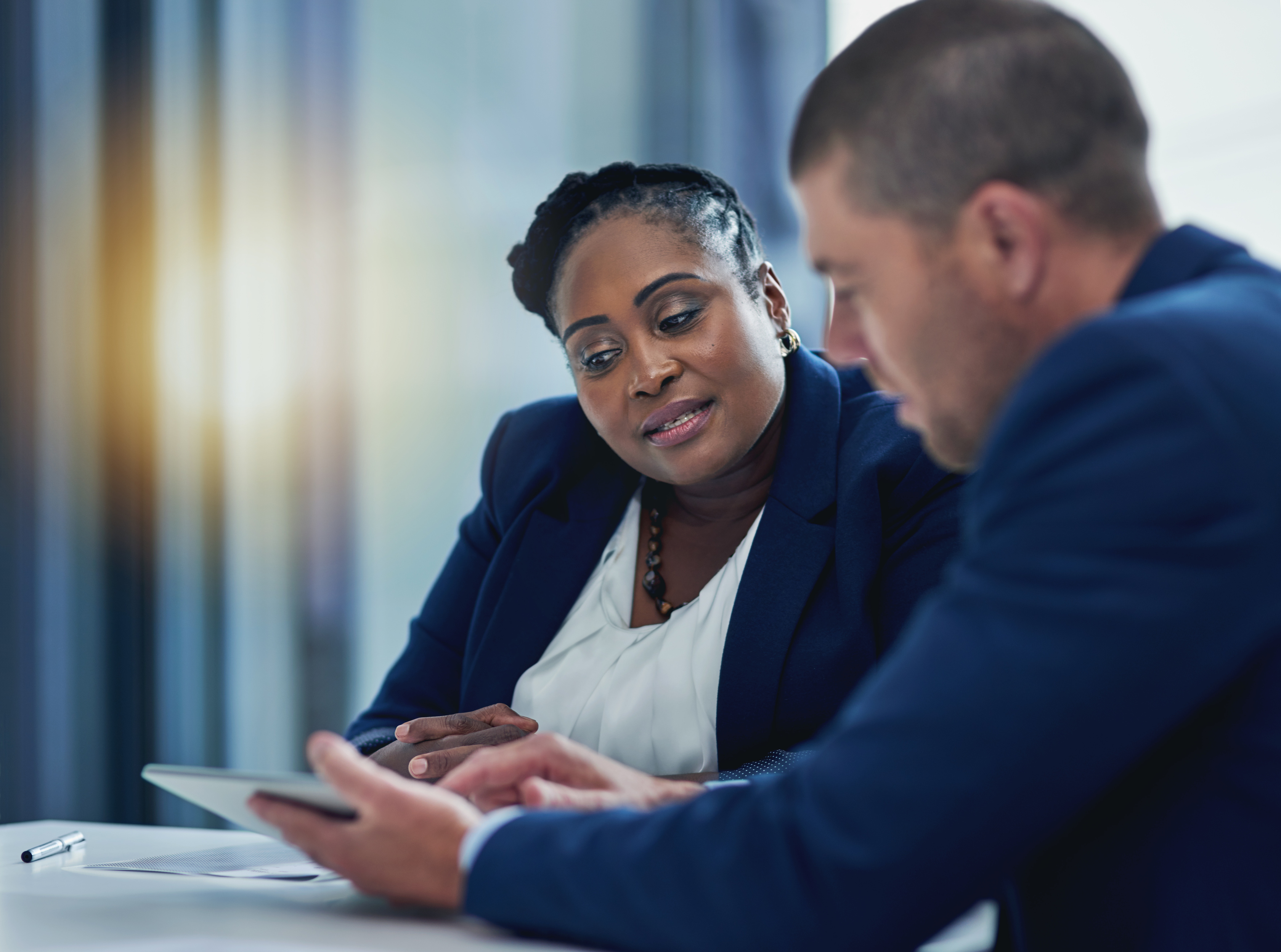 Professionals reviewing information together