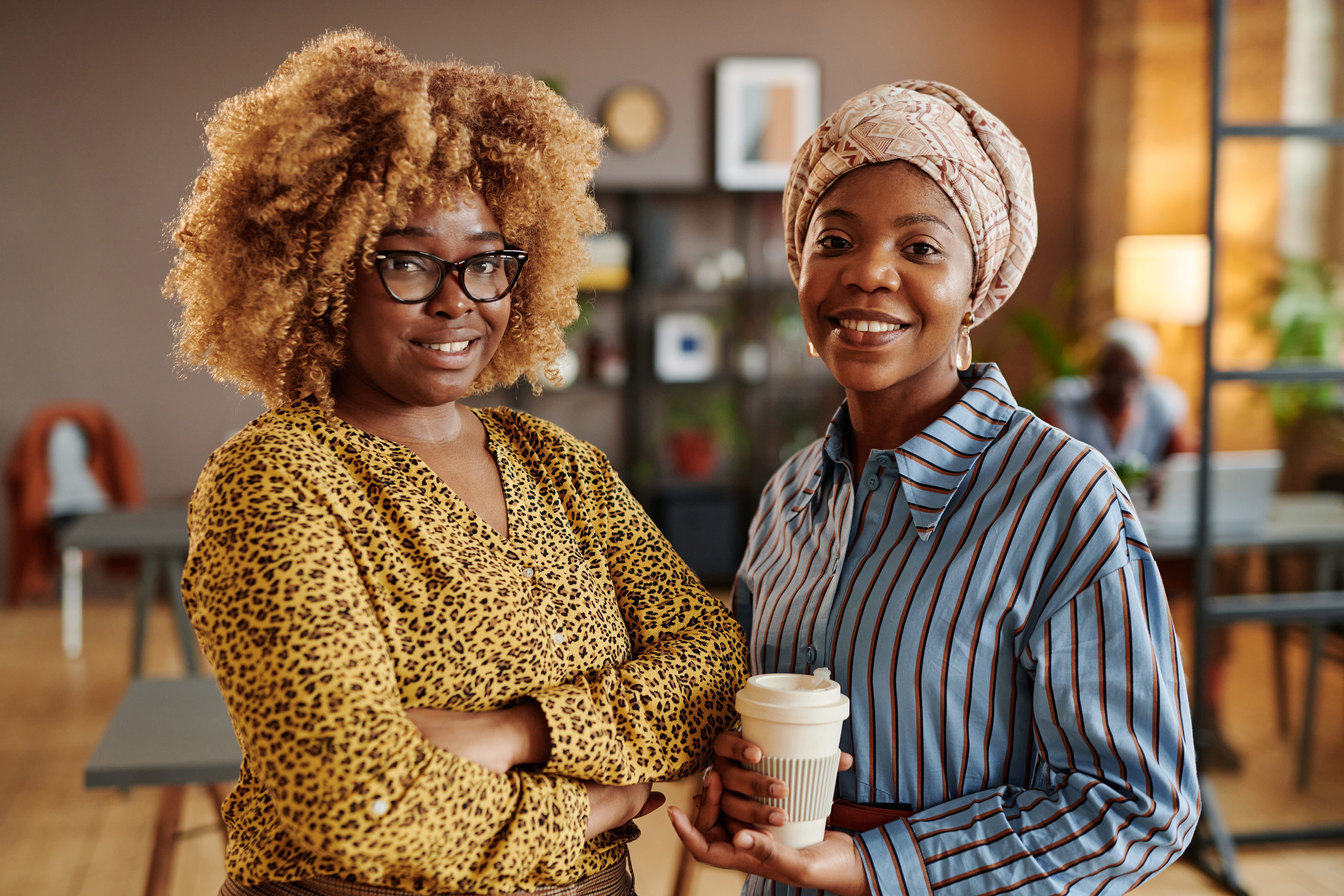 Two colleagues sharing a coffee break